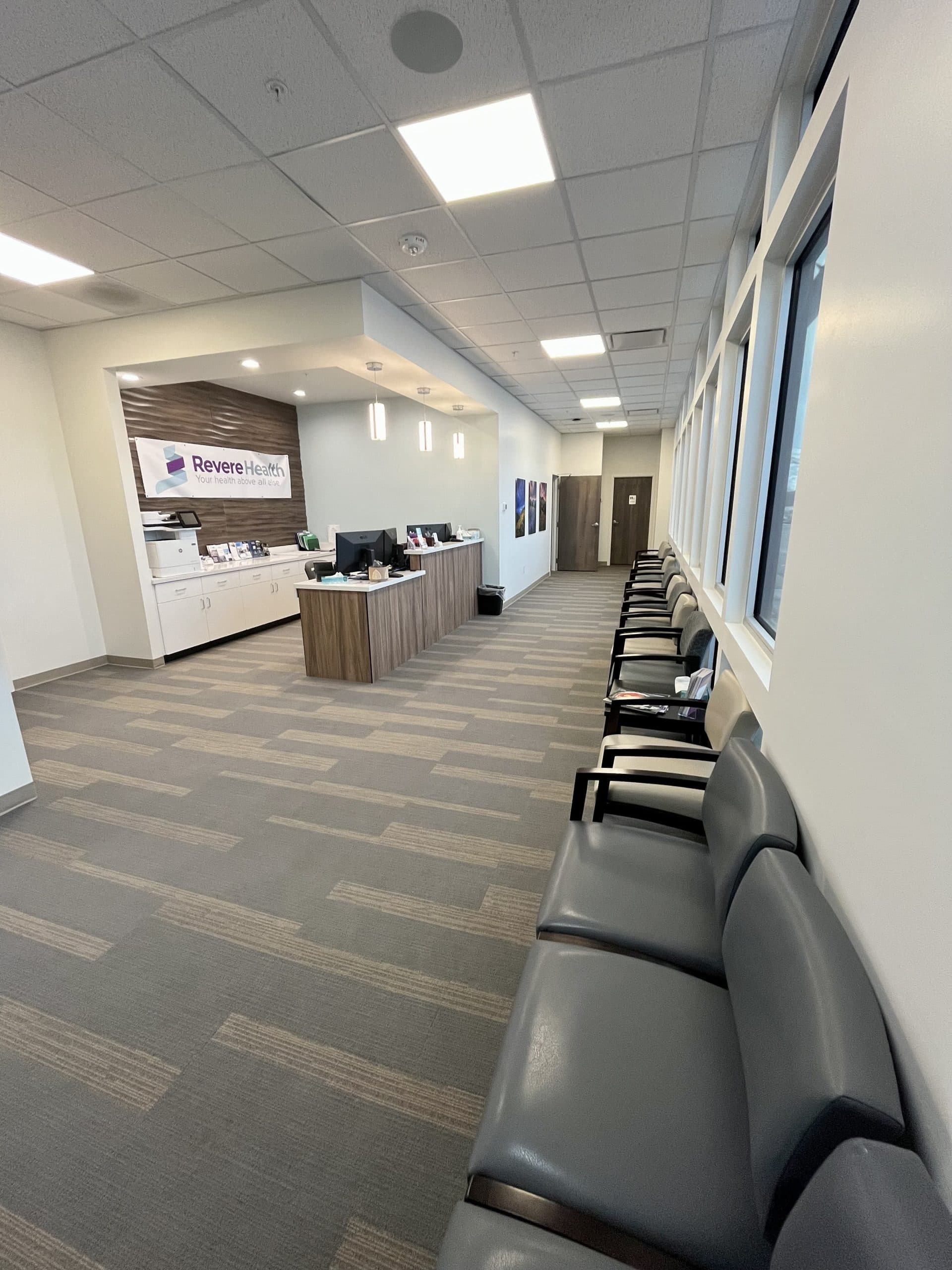 Image of front desk and lobby of doctors office.. Welcome to Revere Health, Heber Family Medicine. Offering premium healthcare to all. Schedule today!