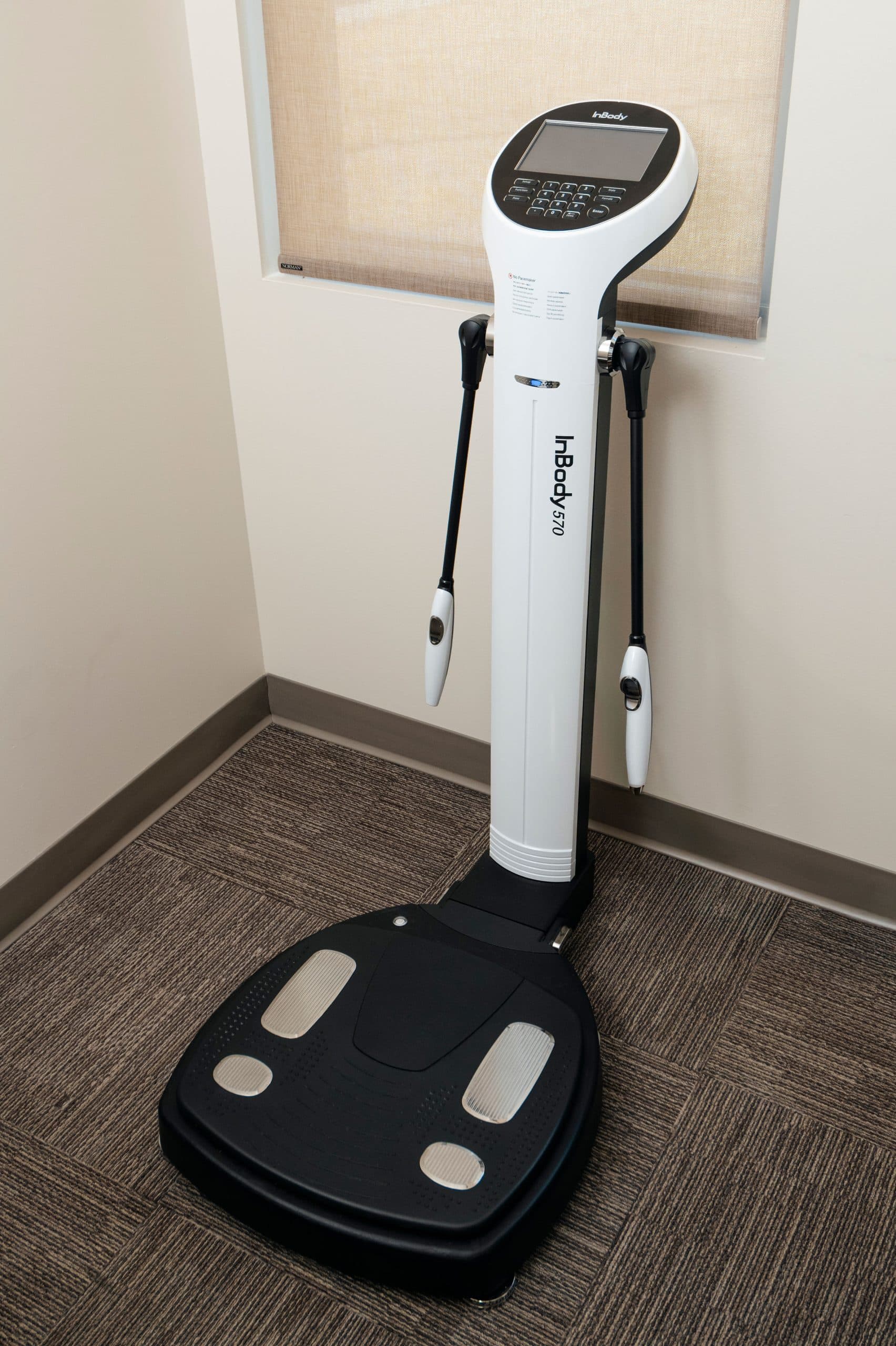 Body composition scale used for tracking weight, body fat, and muscle mass in personalized weight loss programs.