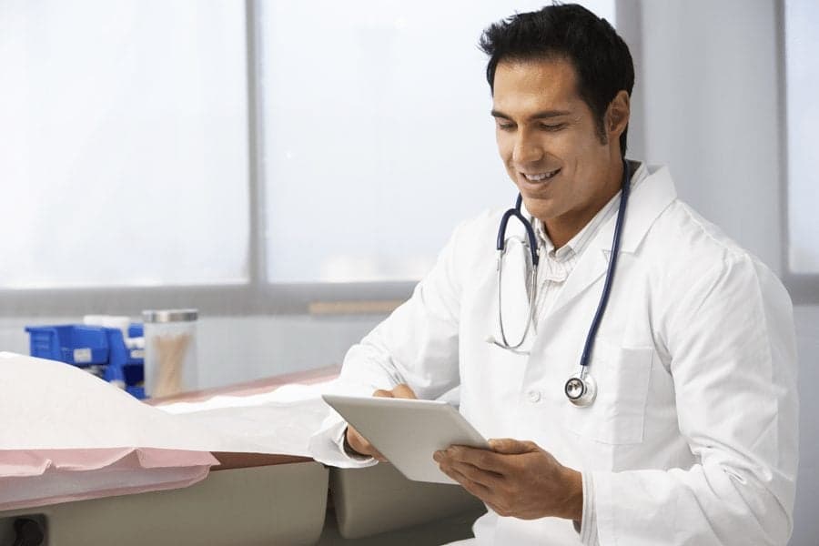 doctor looking at ipad