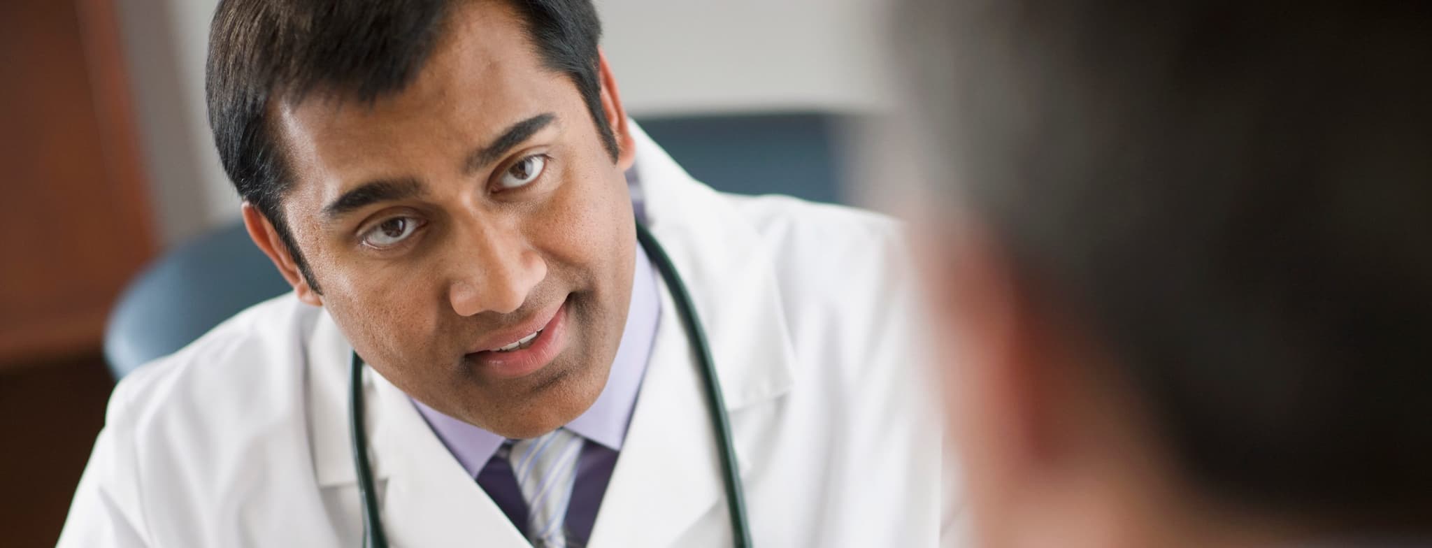 Picture of doctor explaining things to patient