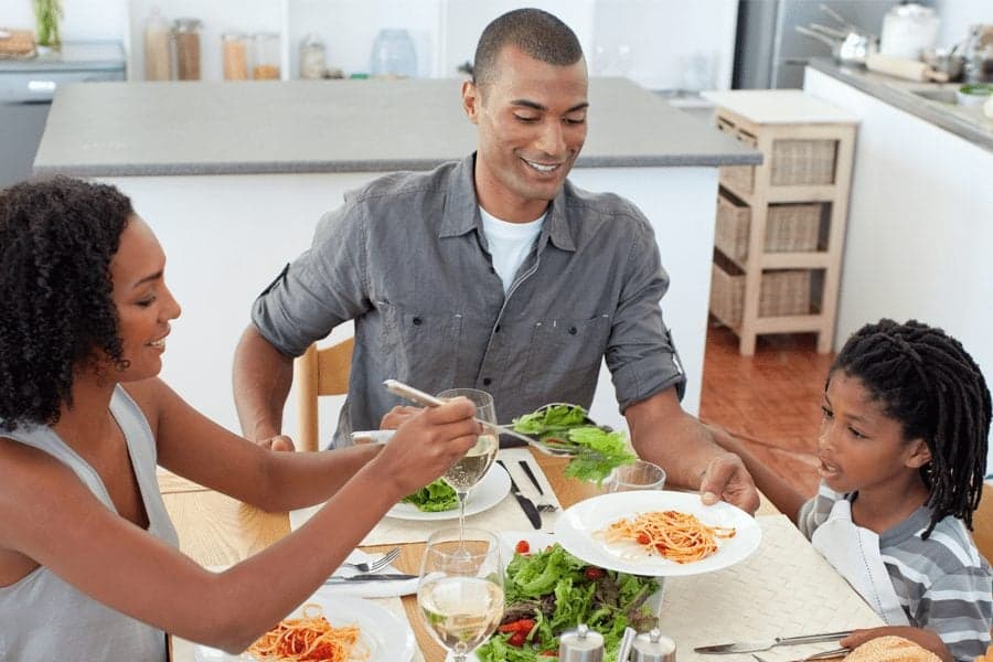 family eating pasta together