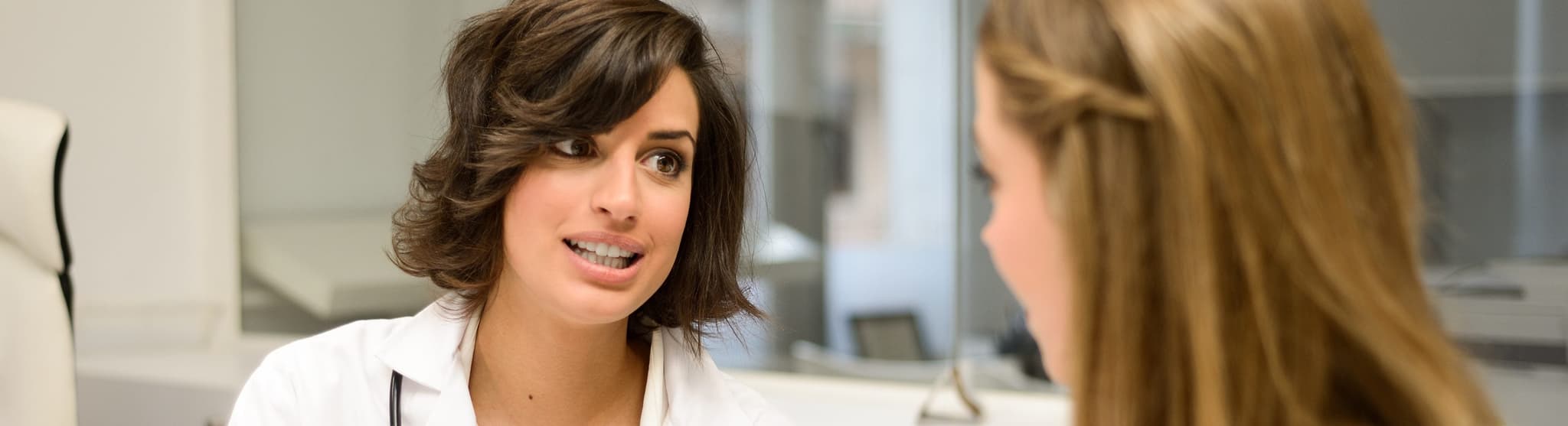 Picture of doctor talking with patient