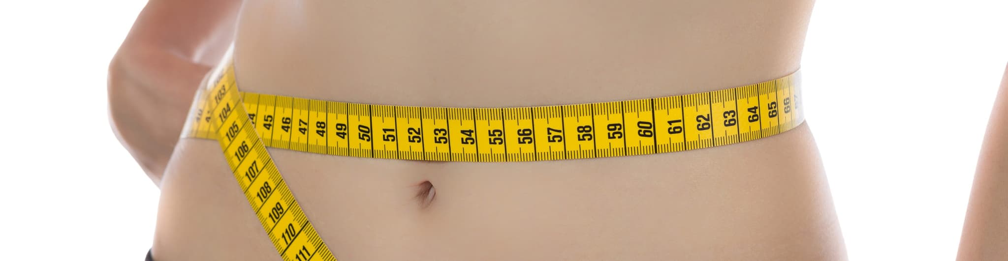 Picture of person wrapping measuring tape around stomach