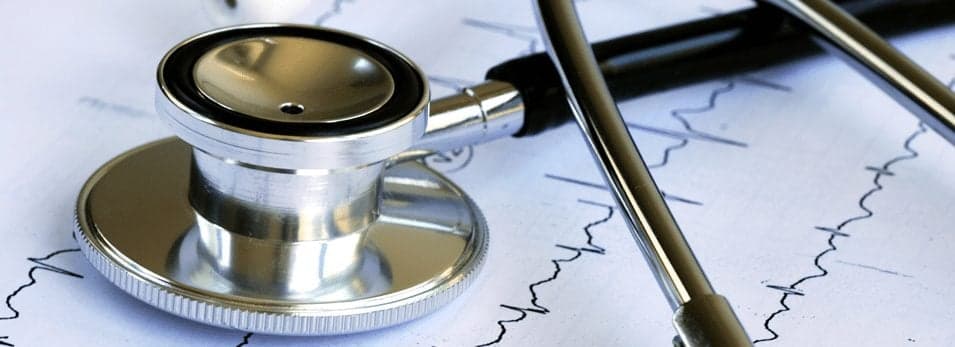 stethoscope on heart rate chart