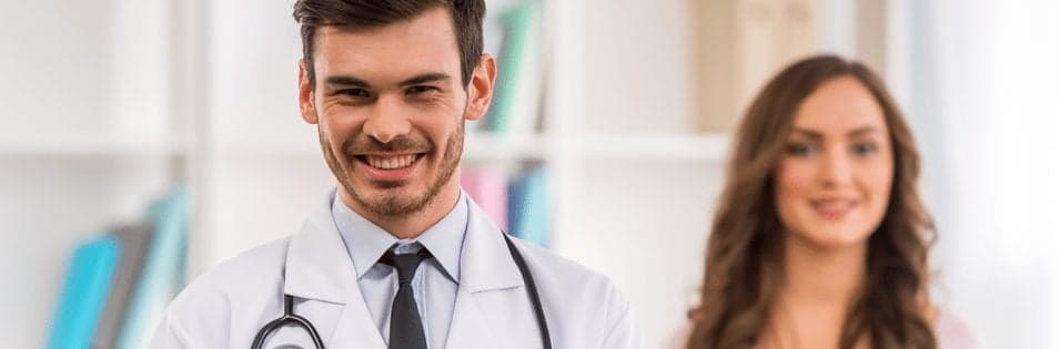 smiling doctor with patient