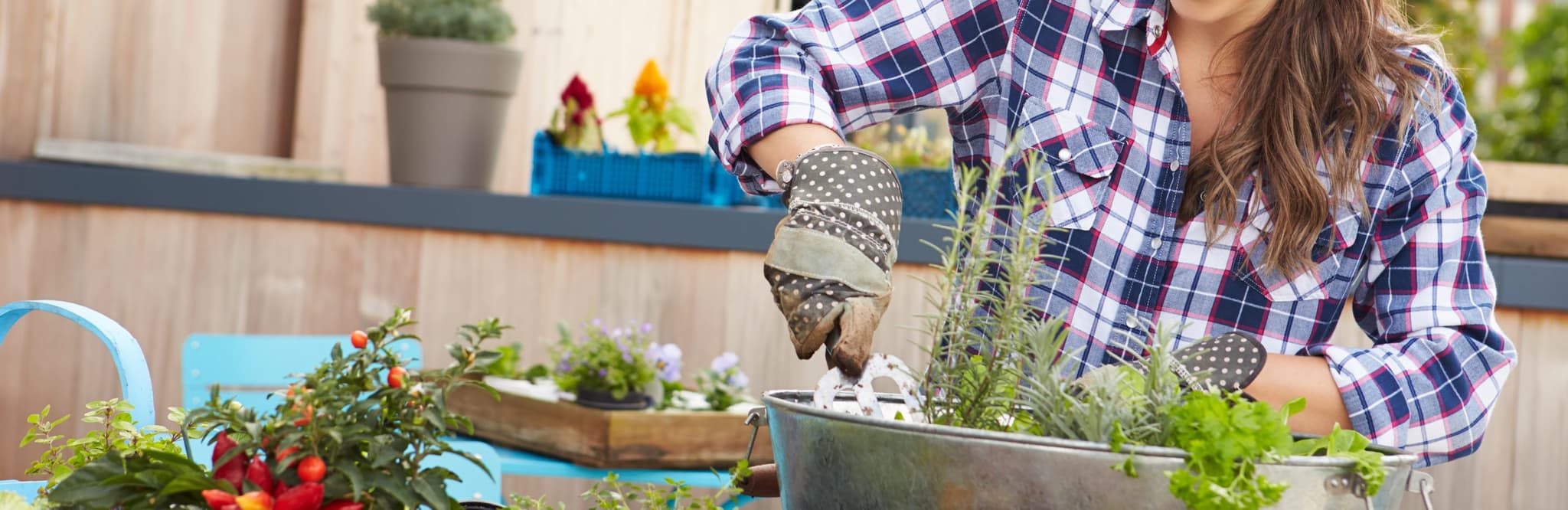 Picture of woman happily gardening