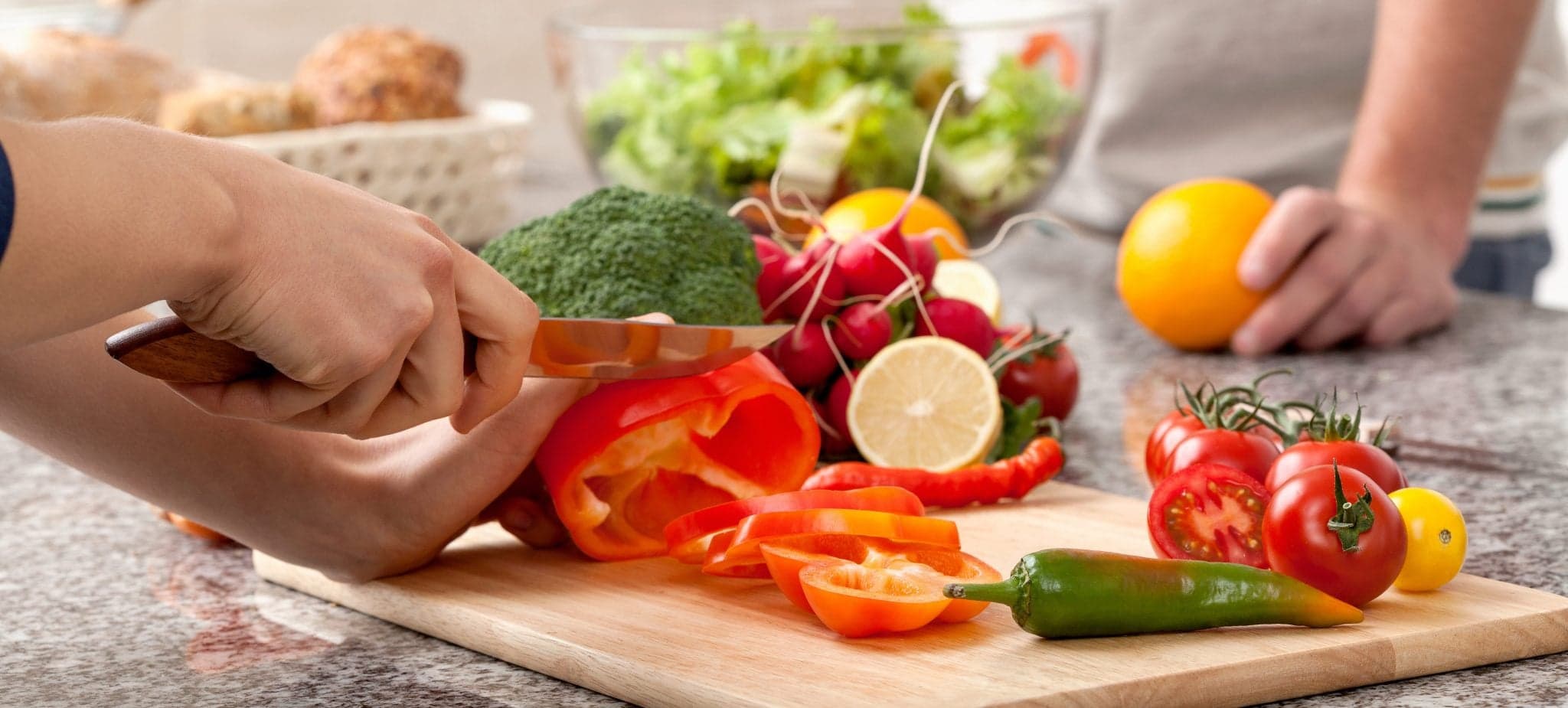 Cutting a vegetables for salad
