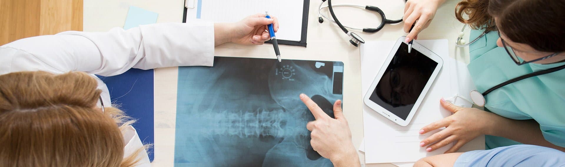 doctors looking at xray