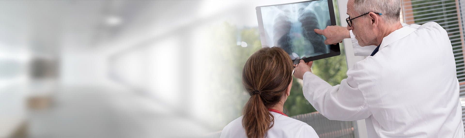 doctors looking at x-ray