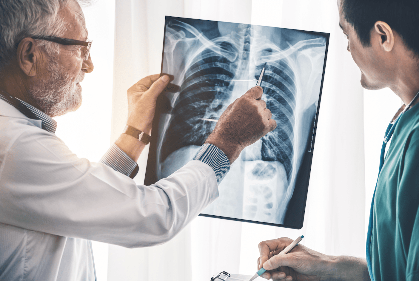 Image of Cardiologist looking at x-ray