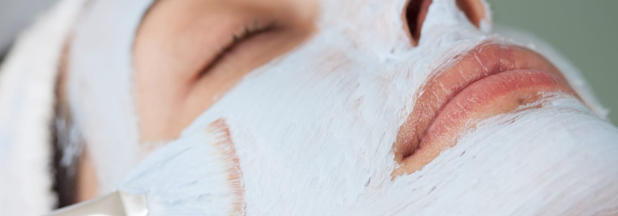 Woman receiving skin treatments