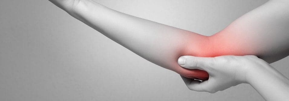 Picture of elbow pain illustrated by red color on greyed picture