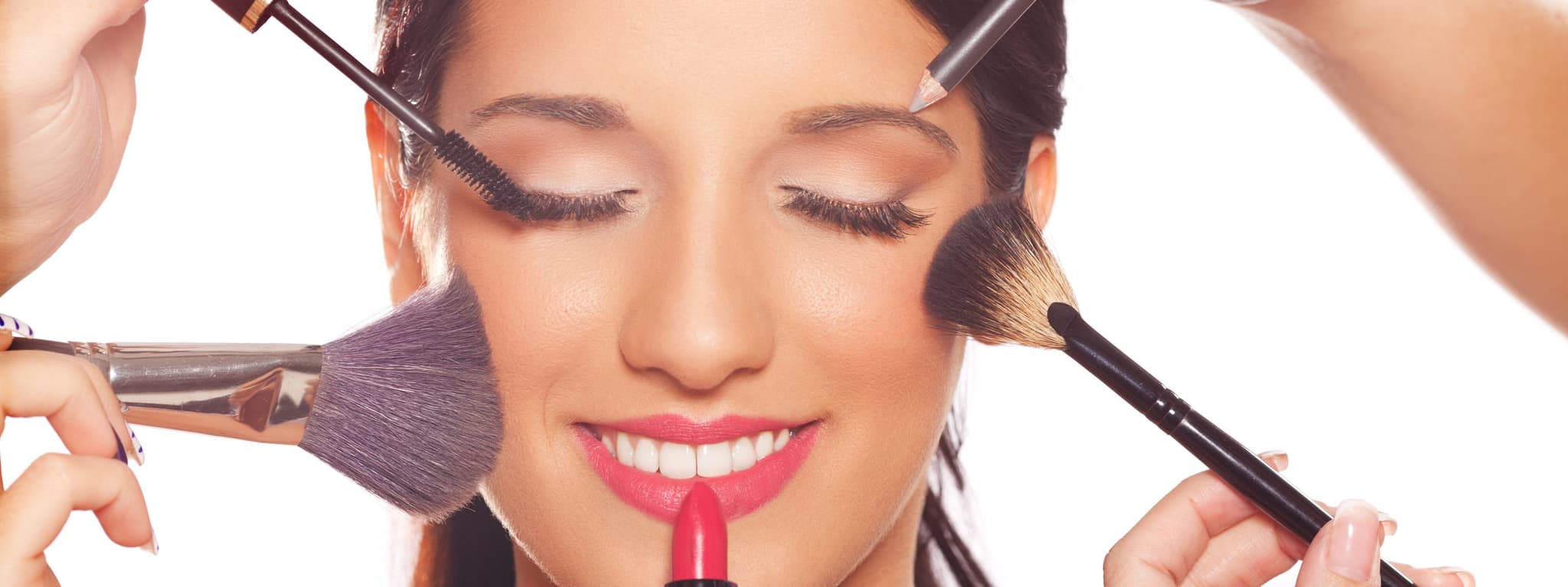 woman getting her makeup done