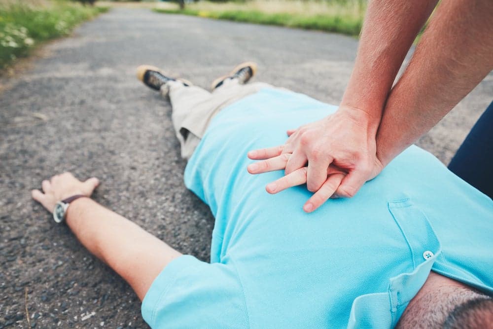 Picture of Dramatic resuscitation on the rural road. Themes rescue, help and hope.