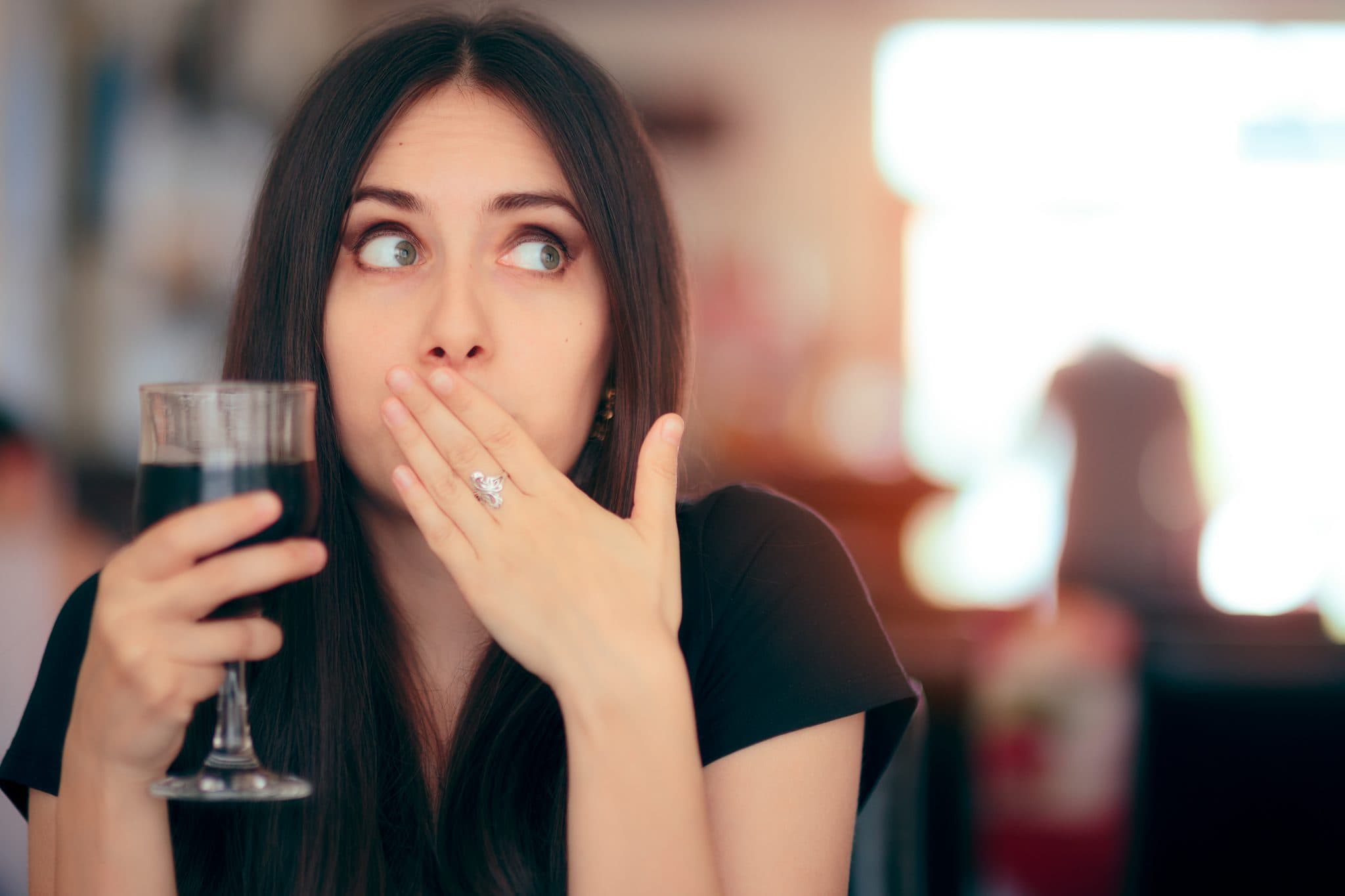 Funny Girl Reacting after Drinking Frizzy Soda Drink