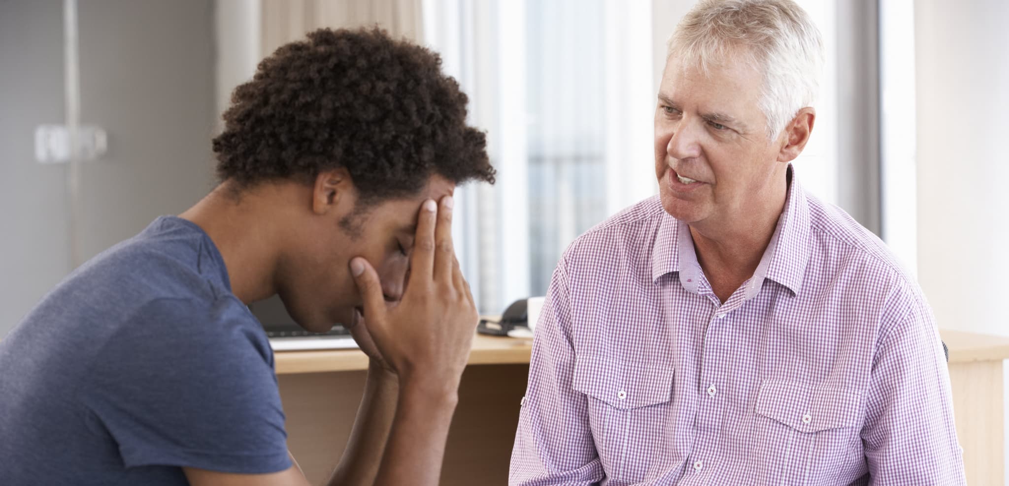 Young Man Having Counselling Session