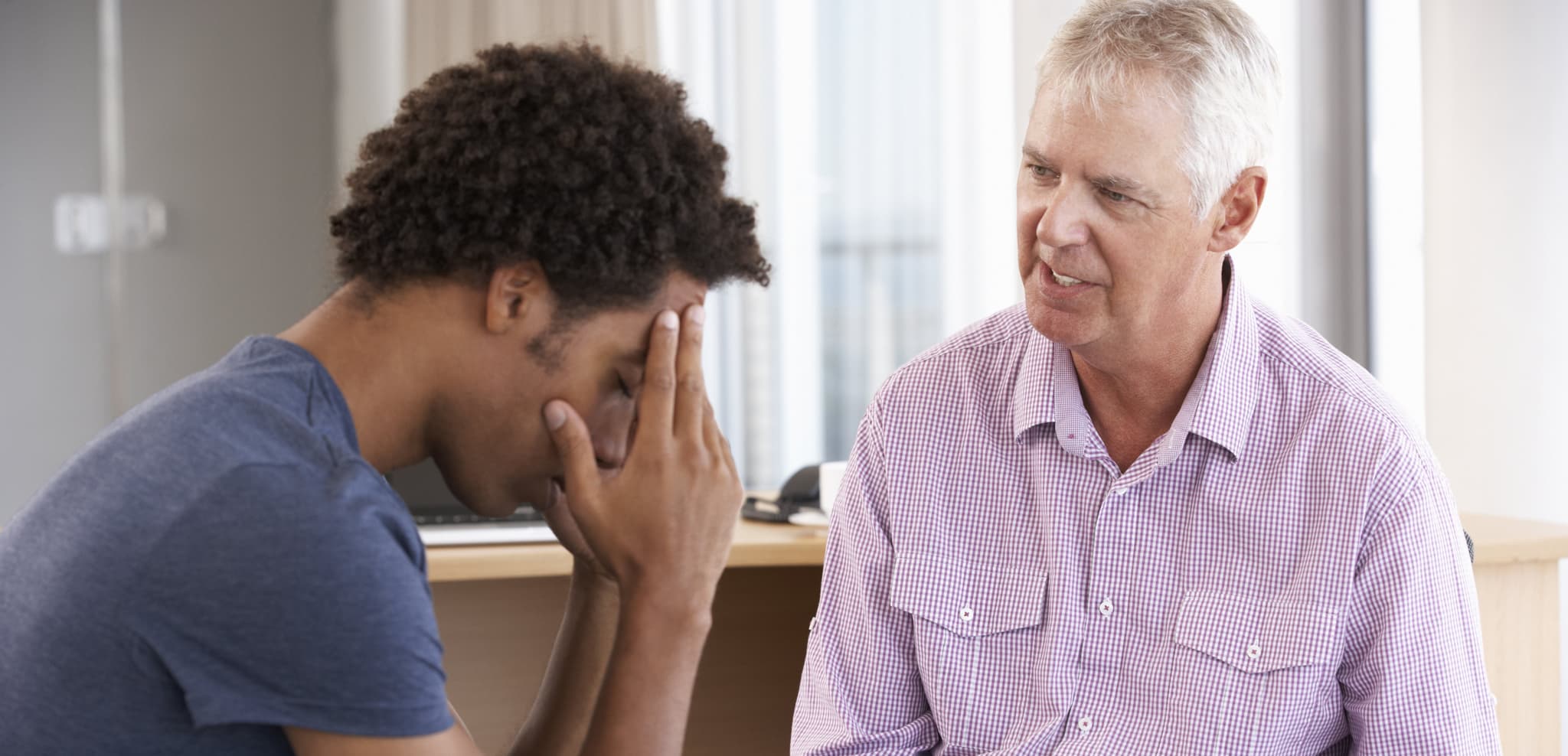 Picture of Young Man Having Counselling Session