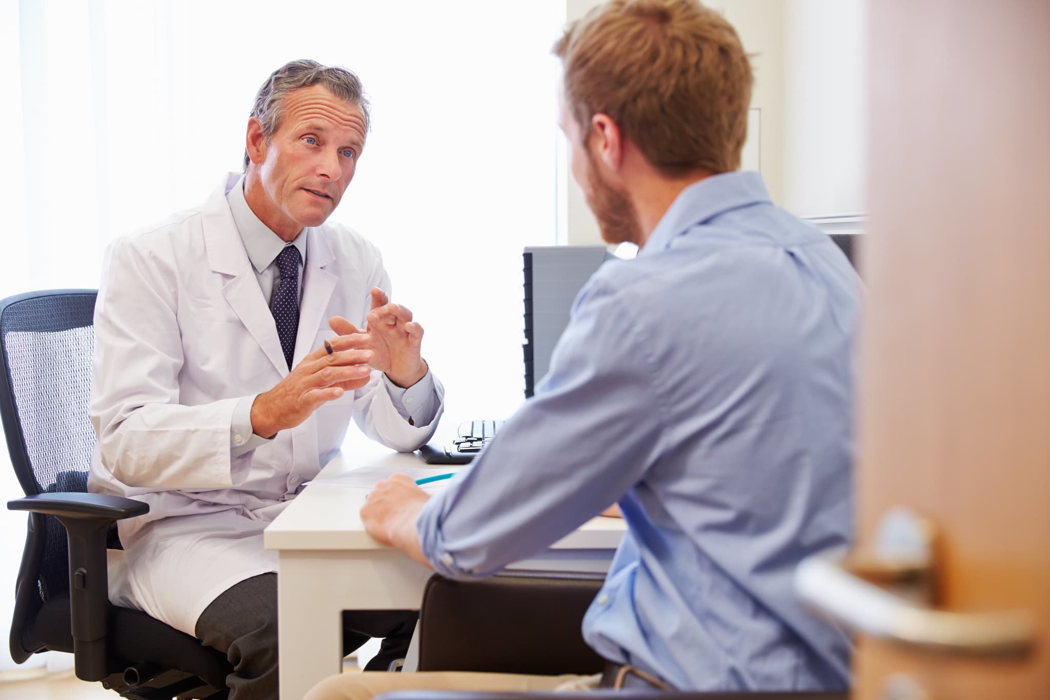 Doctor meeting with patient