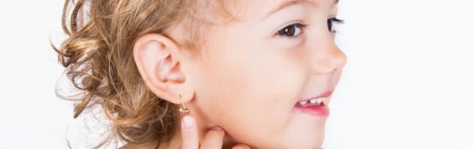 Picture of child showing ear piercing