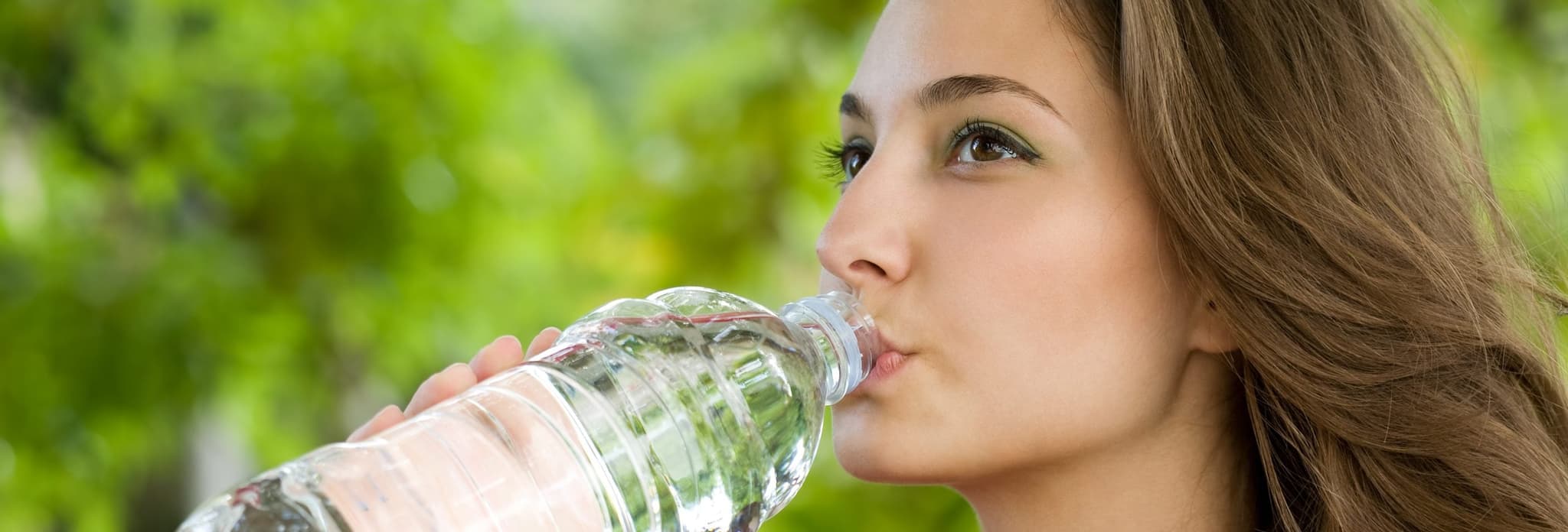 Picture of woman drinking bottled water