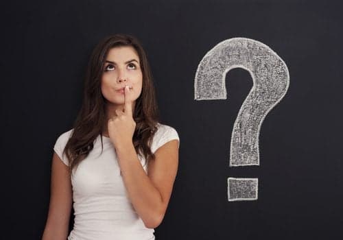 Picture of Woman with question mark on blackboard
