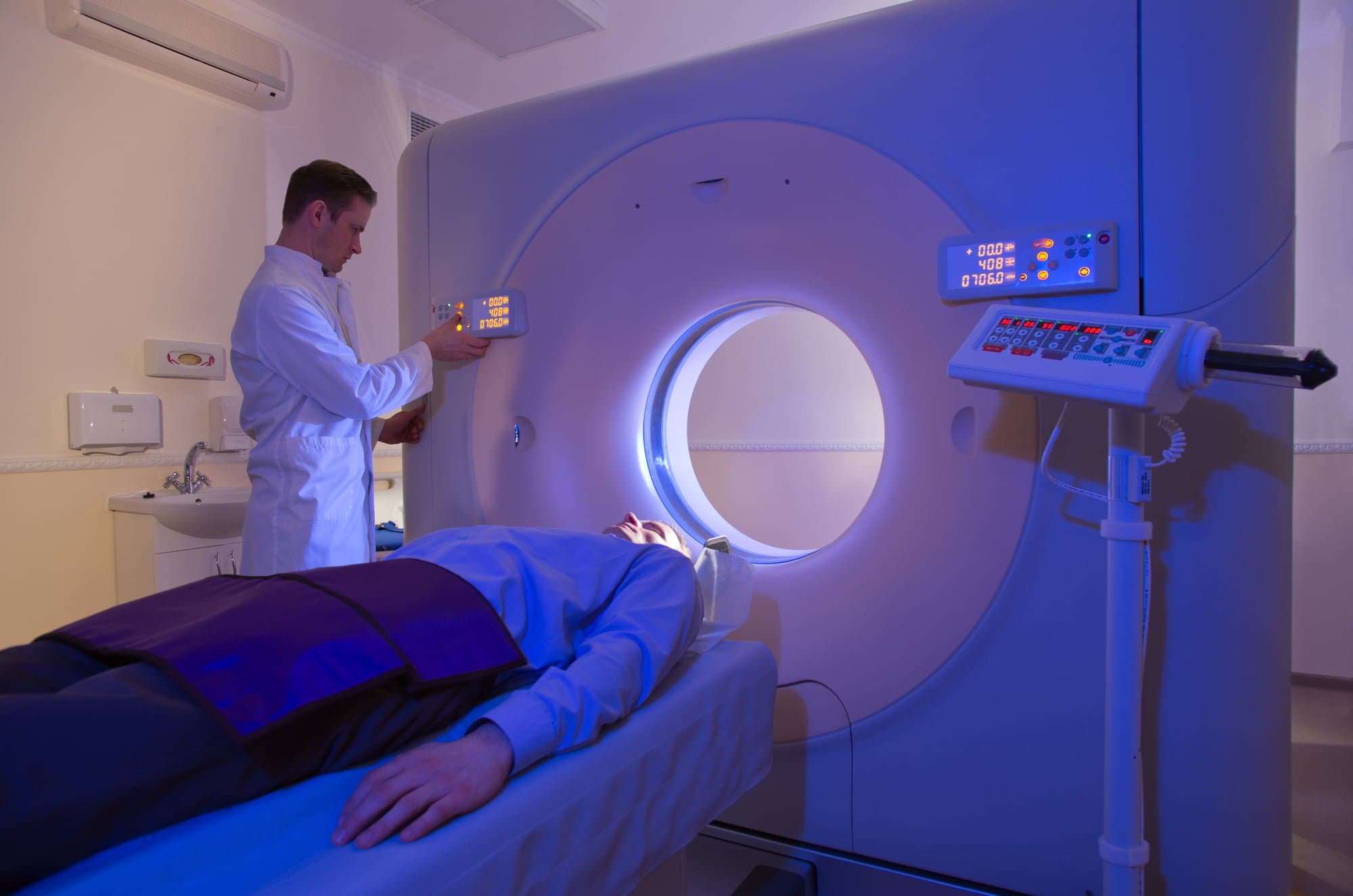 Picture of Technologist testing patient with CT Scan Machine