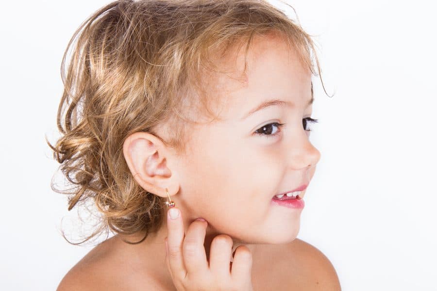 Picture of child showing ear piercing