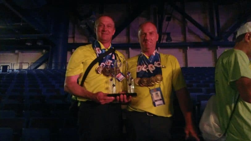 two men with lots of awards - Double Transplant Recipient To Compete In Transplant Games With Donor