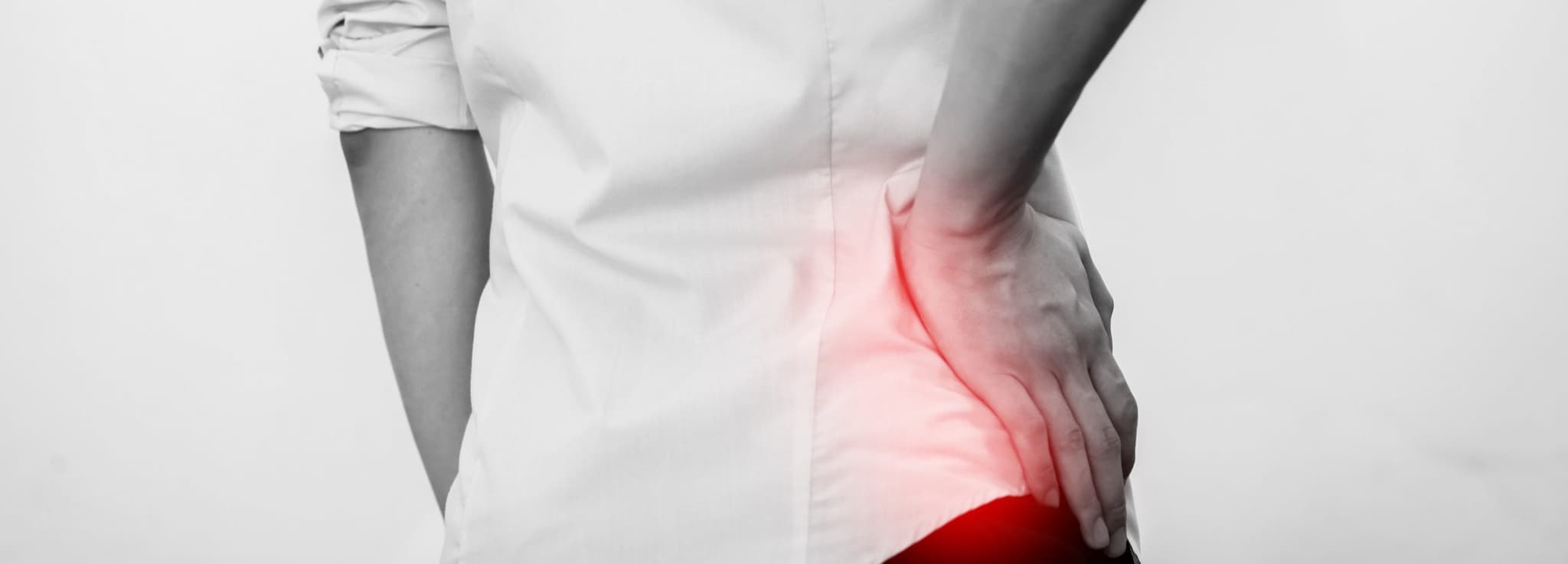 Picture of person with hip pain illustrated by red color