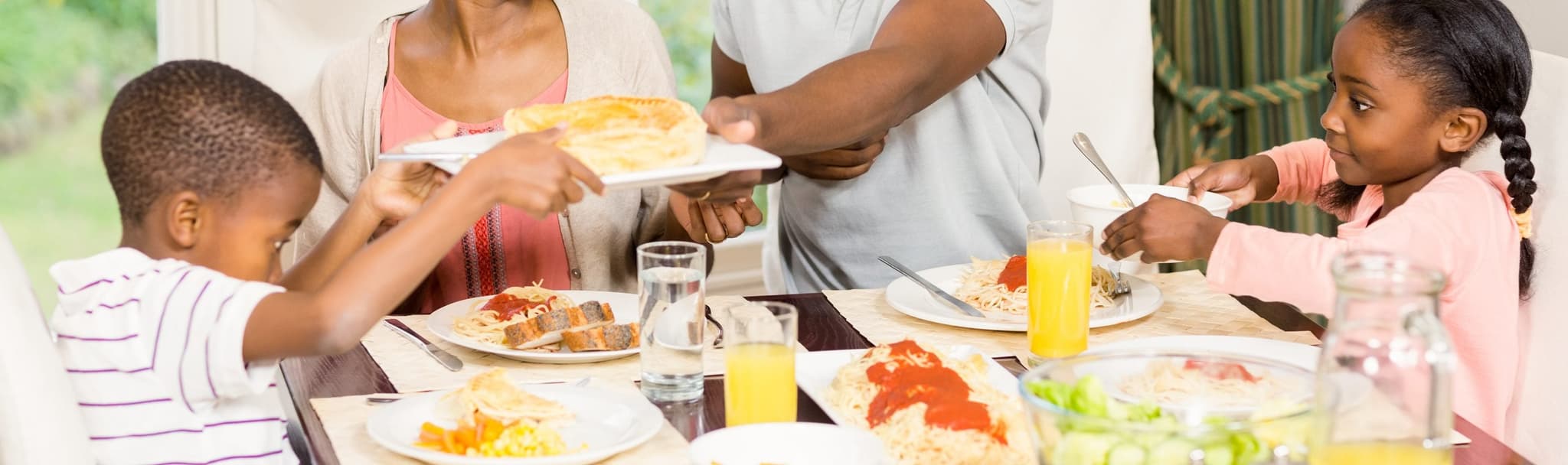 Picture of family eating dinner together