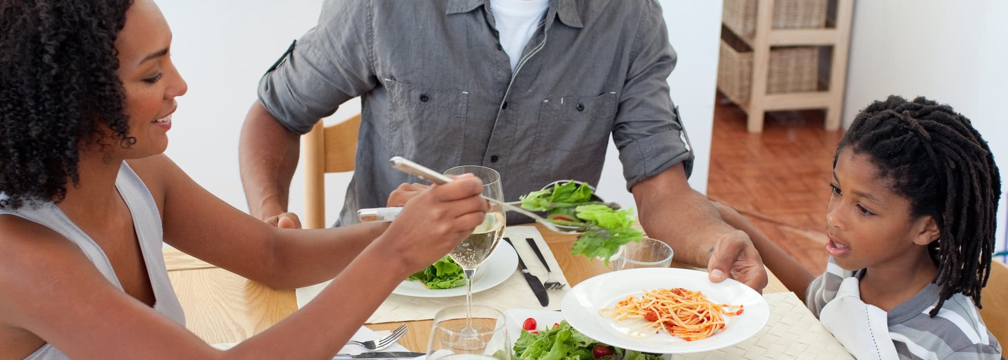 family eating pasta together