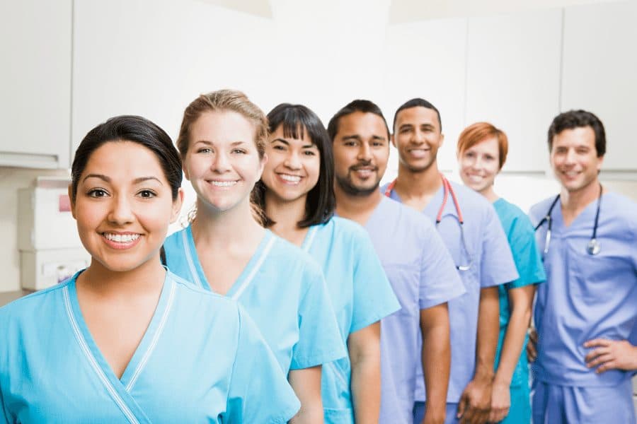 Picture of line of smiling doctors