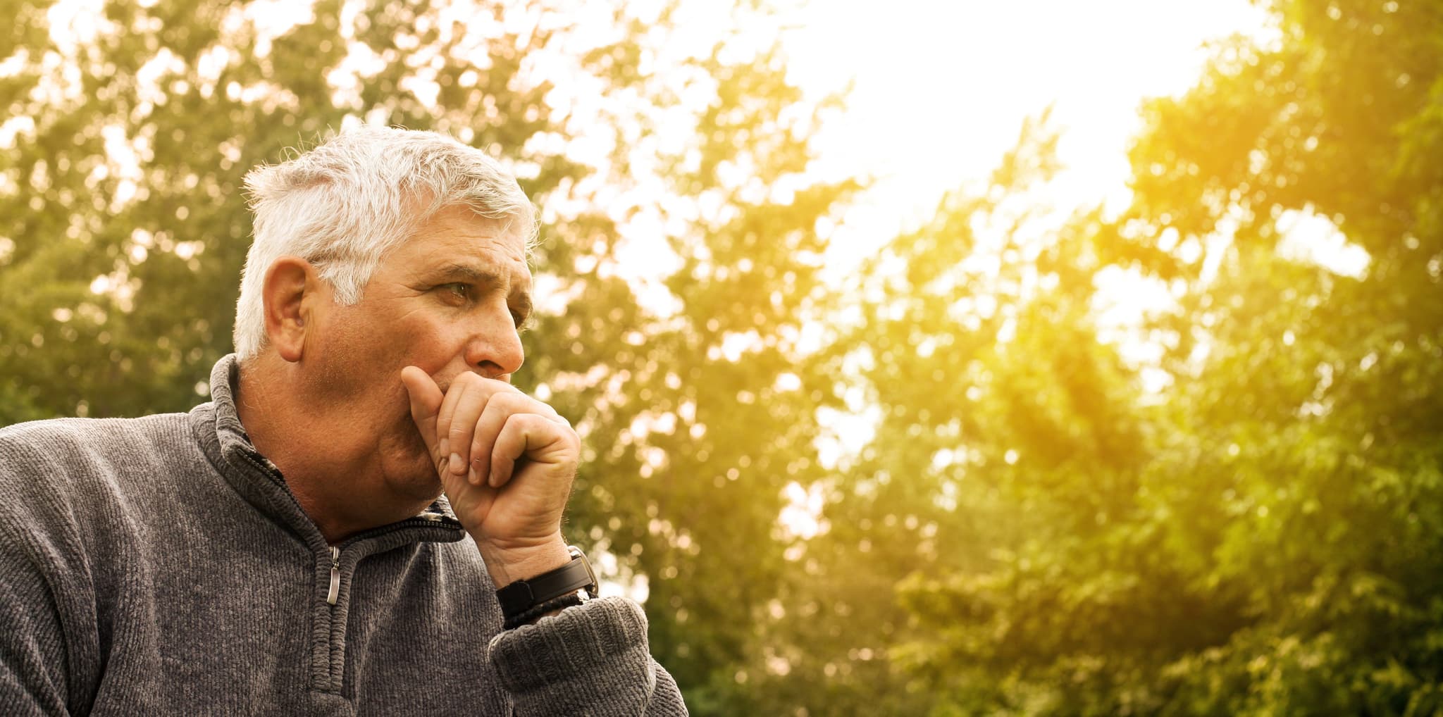 Picture of Coughing Senior Man on fresh air.