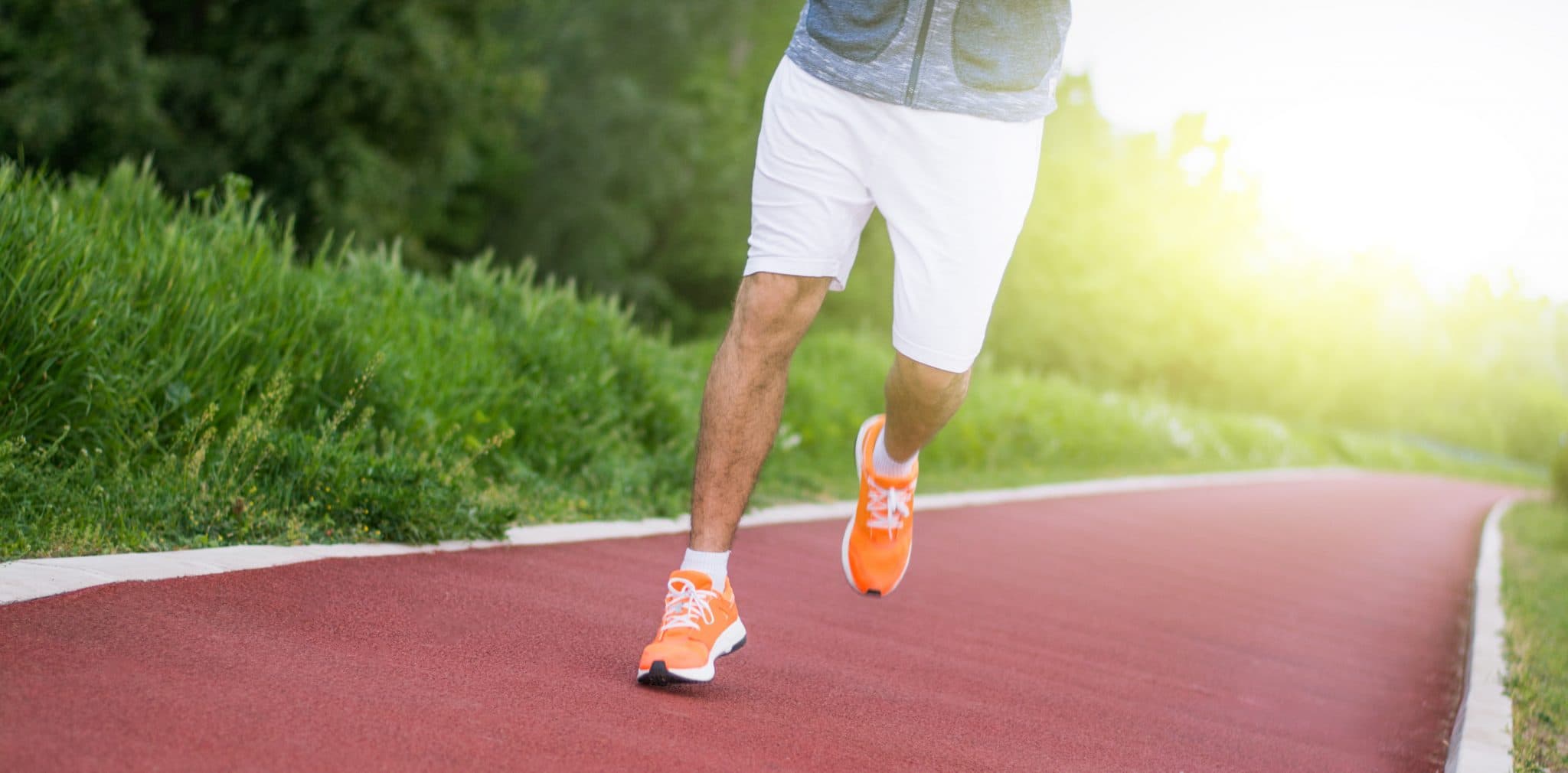 Picture of Young man jogging, waist down