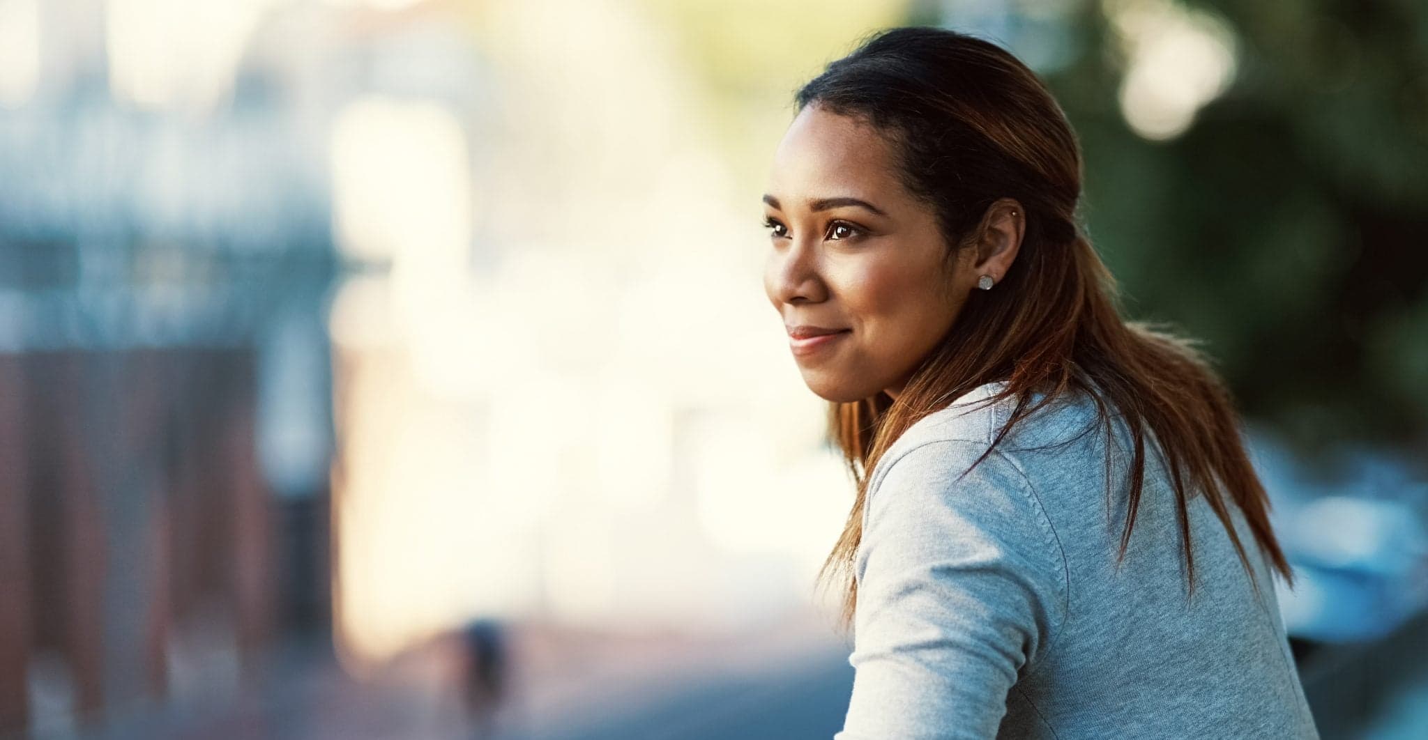 Picture of Shot of an attractive young businesswoman standing on her office balcony