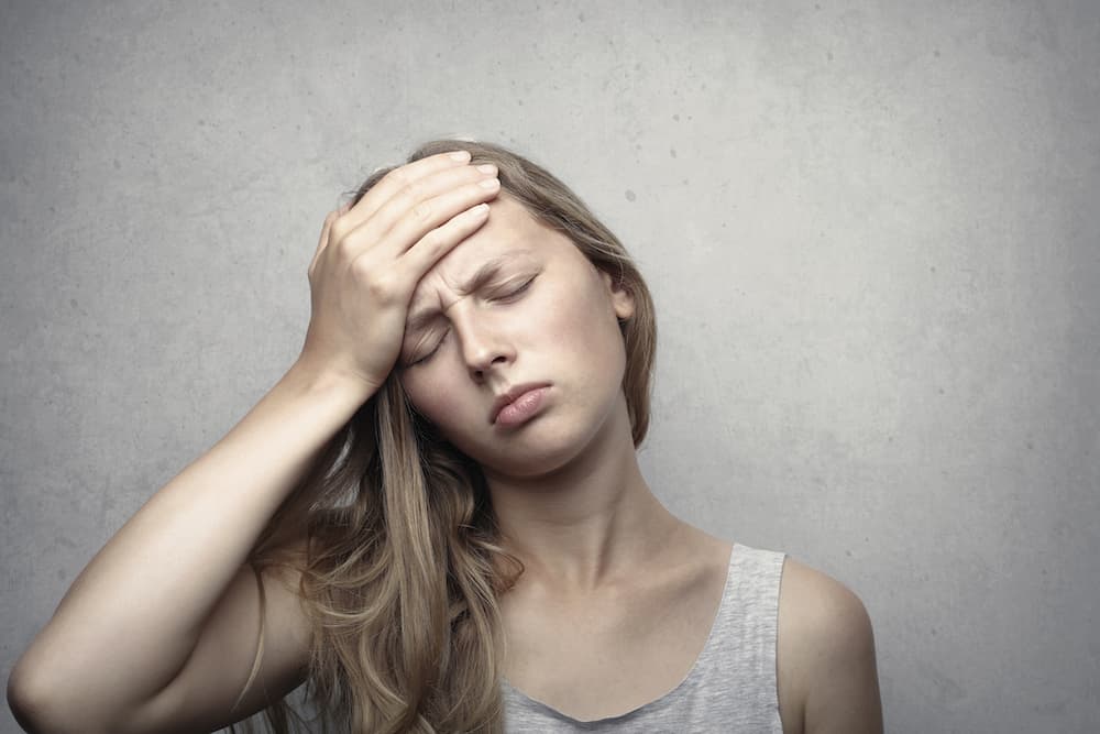 Picture of Young girl is suffering from headache