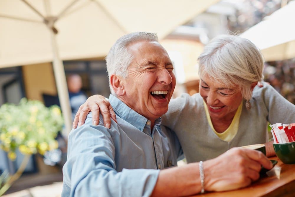 Picture of elderly couple laughing