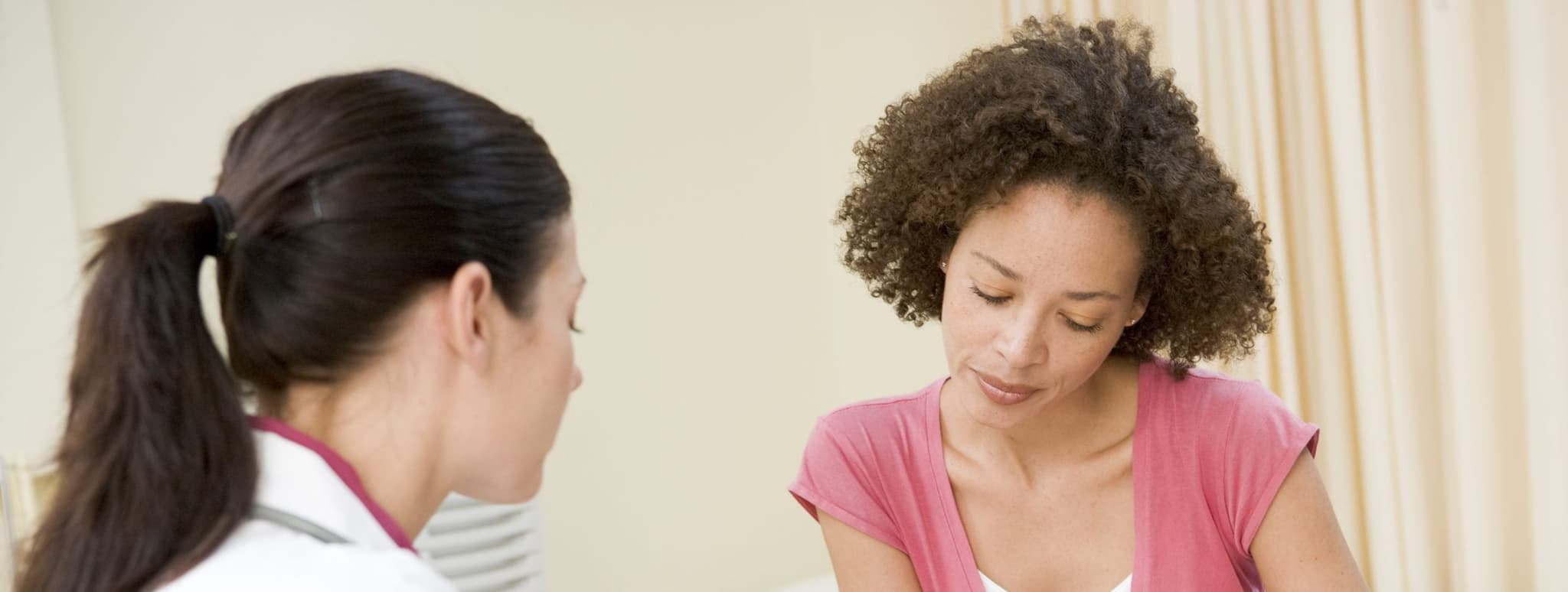 Picture of doctor explaining things to patient