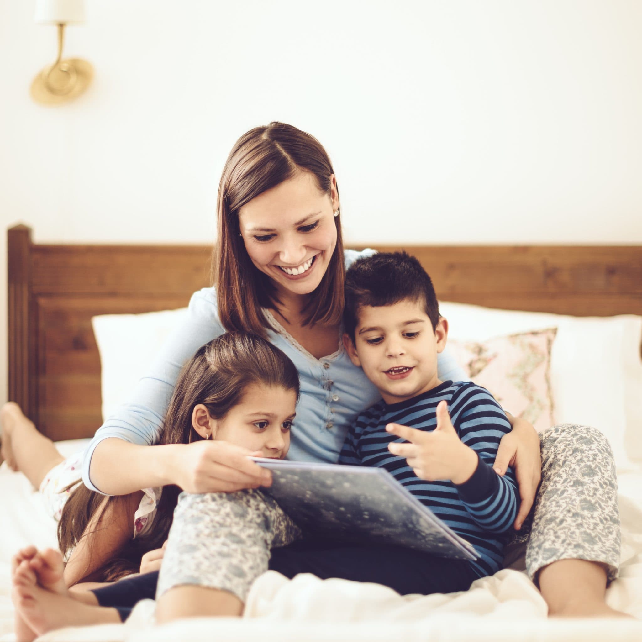 Happy family in the bedroom