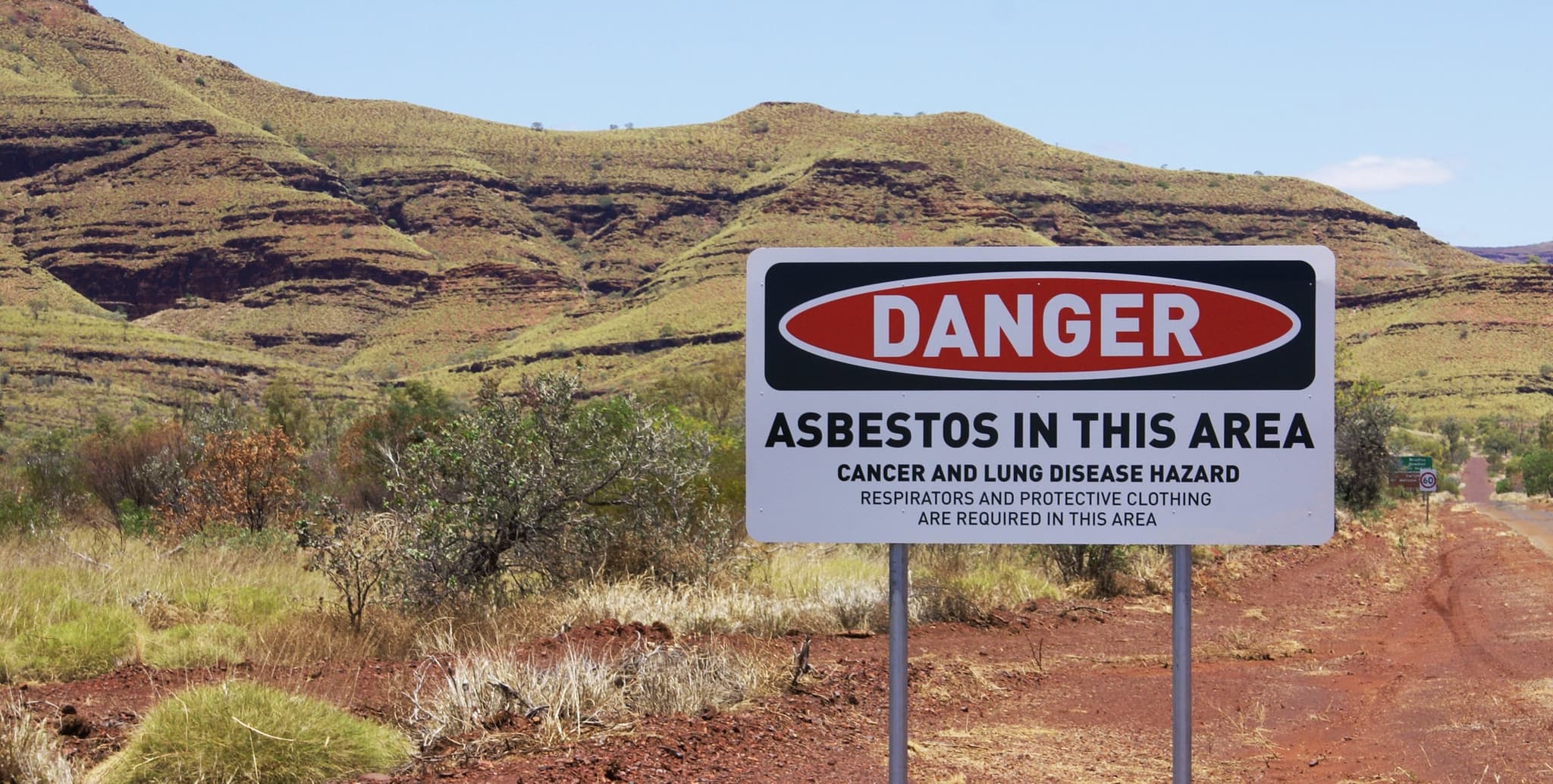 Picture of A sign warning of asbestos outside Wittenoom in outback Australia