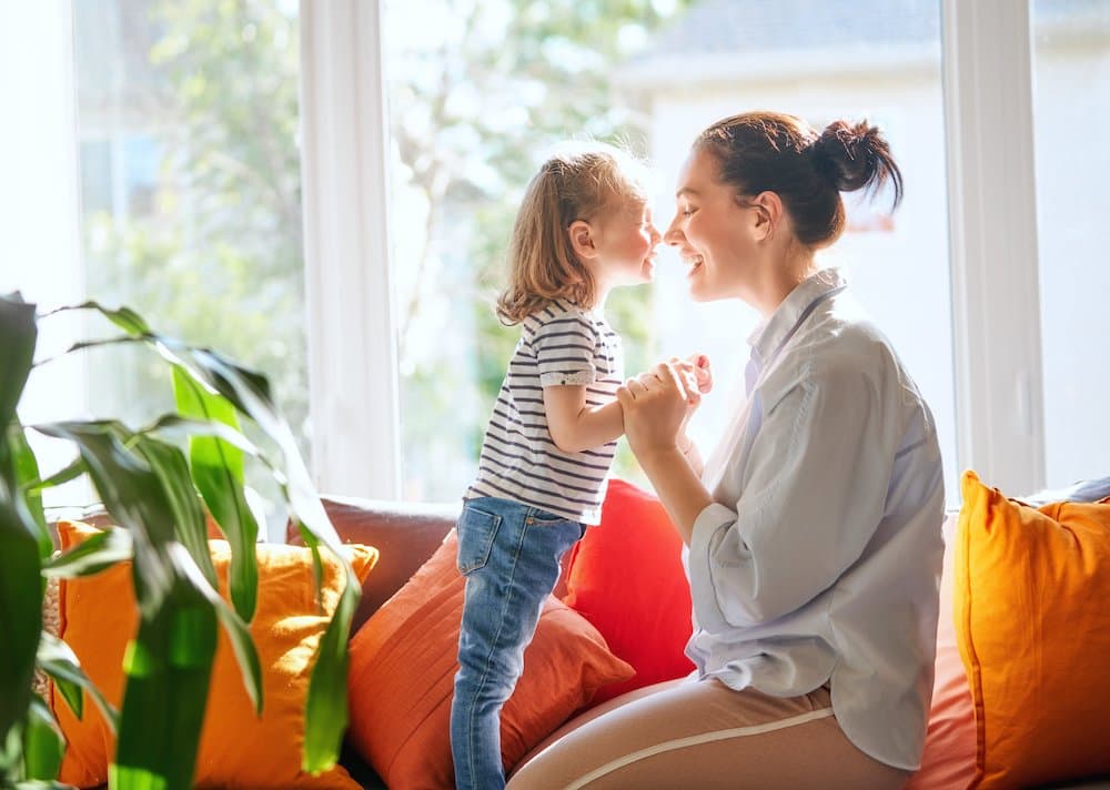 mother and daughter playing
