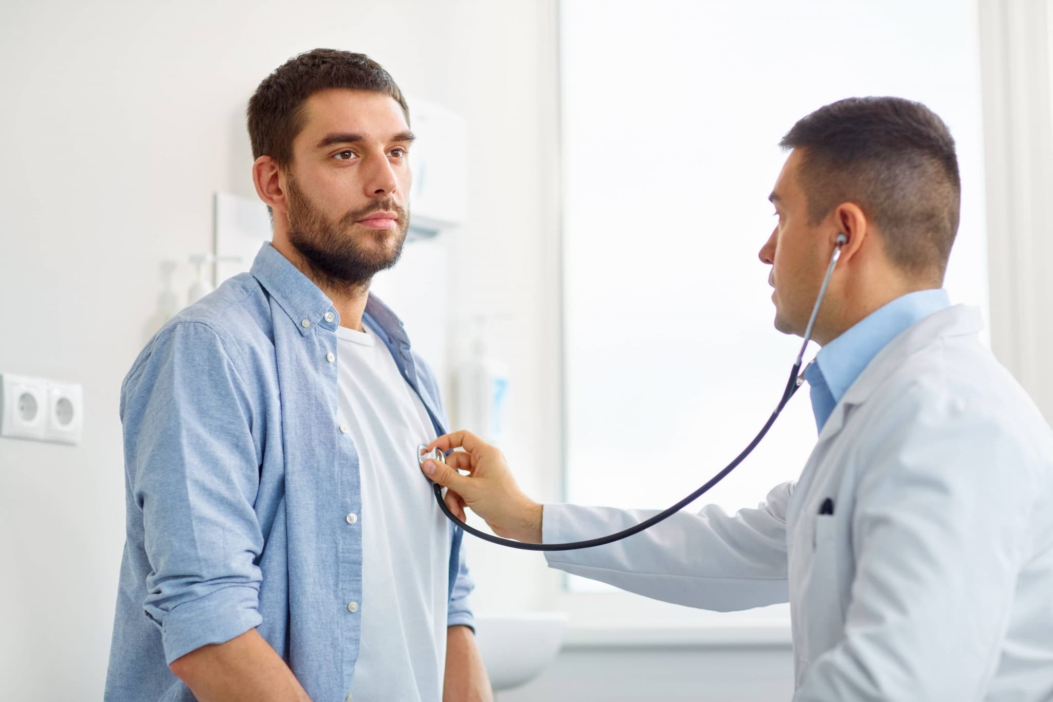 adult man getting check up