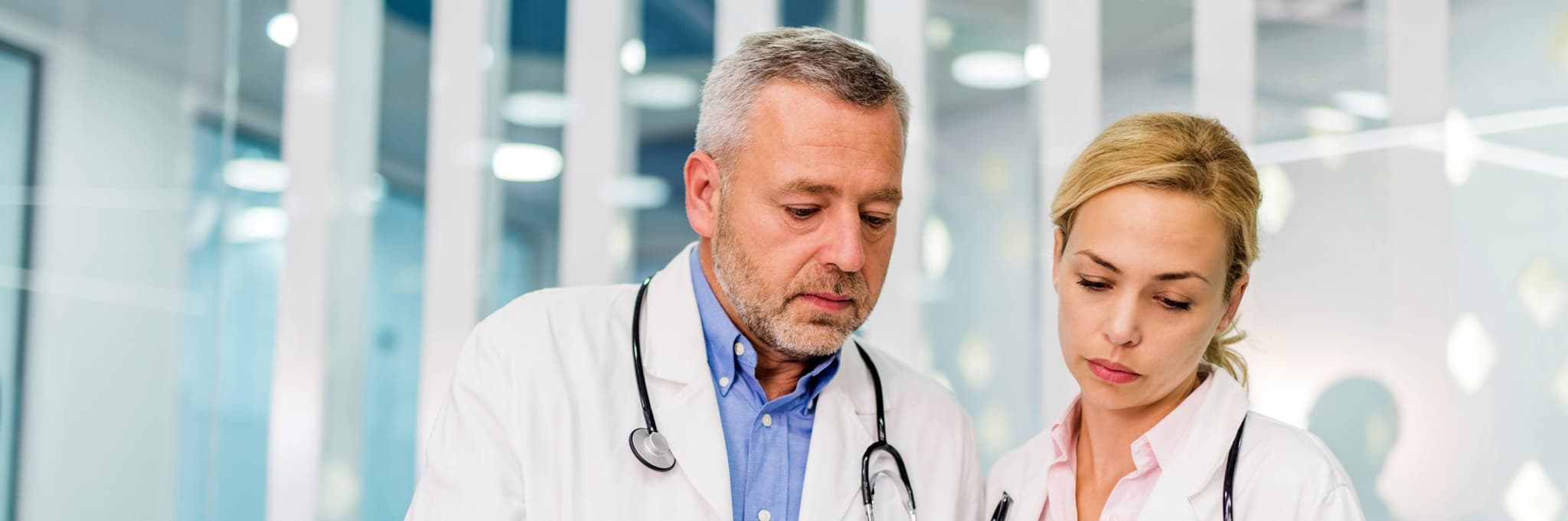 doctors looking at report